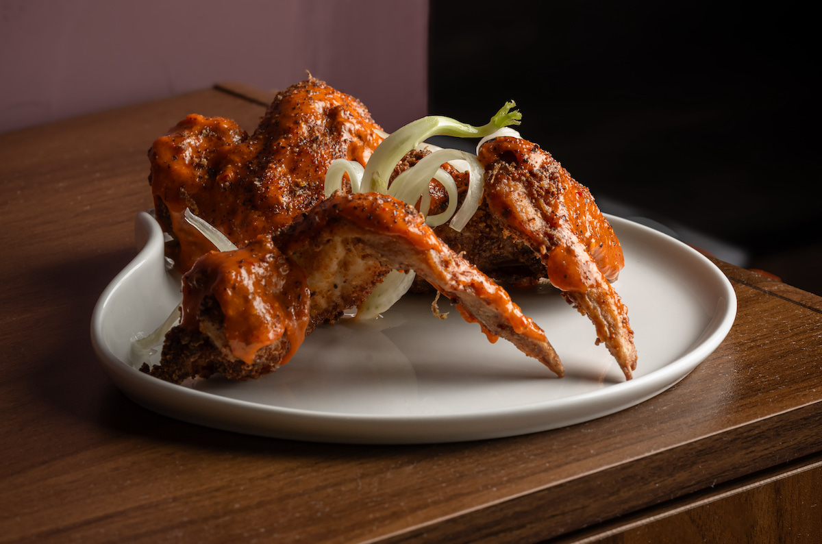 Lemon pepper wings are among the dishes at Heritage, where Brown draws from the flavors and culinary traditions of the African diaspora. | Photo by Lauren Lynn Foto