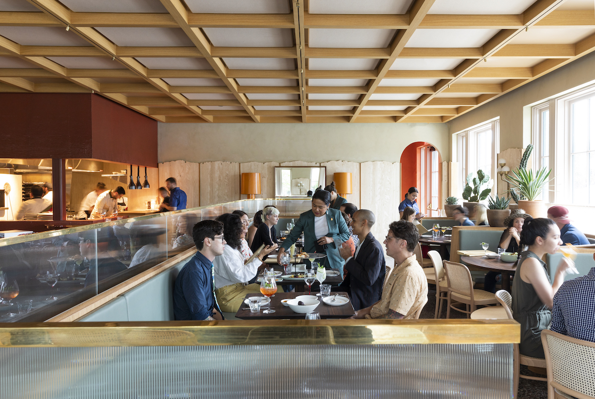 The lively dining room at Rosie Cannonball, a Montrose favorite for wood-fired pizzas, pastas, and Italian-inspired fare. | Photo by Julie Soefer