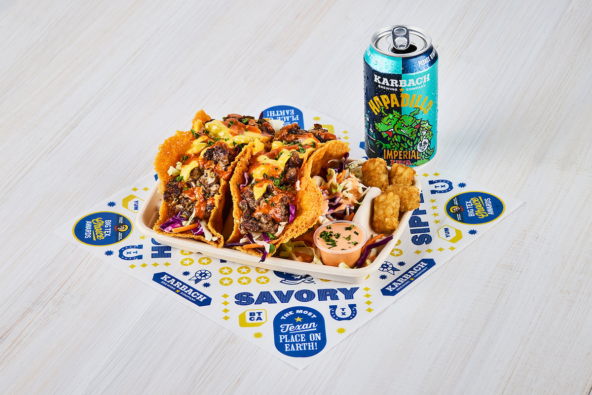 Burger Chop Tater Tacos, featuring tater tot taco shells loaded with chopped burger patties, cheese, coleslaw, and buffalo sauce, earned the 2026 Big Tex Choice Award for Best Taste–Savory. | Photo by the State Fair of Texas