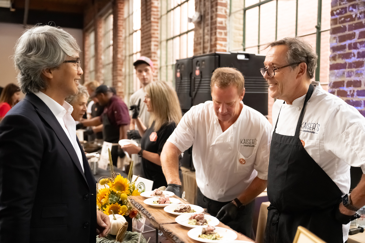 Peter Kaiser of Kaiser’s Chophouse serves guests at Party in the Kitchen. Kaiser returns as a chef co-chair for this year’s event. | Photo by Open Hand Atlanta