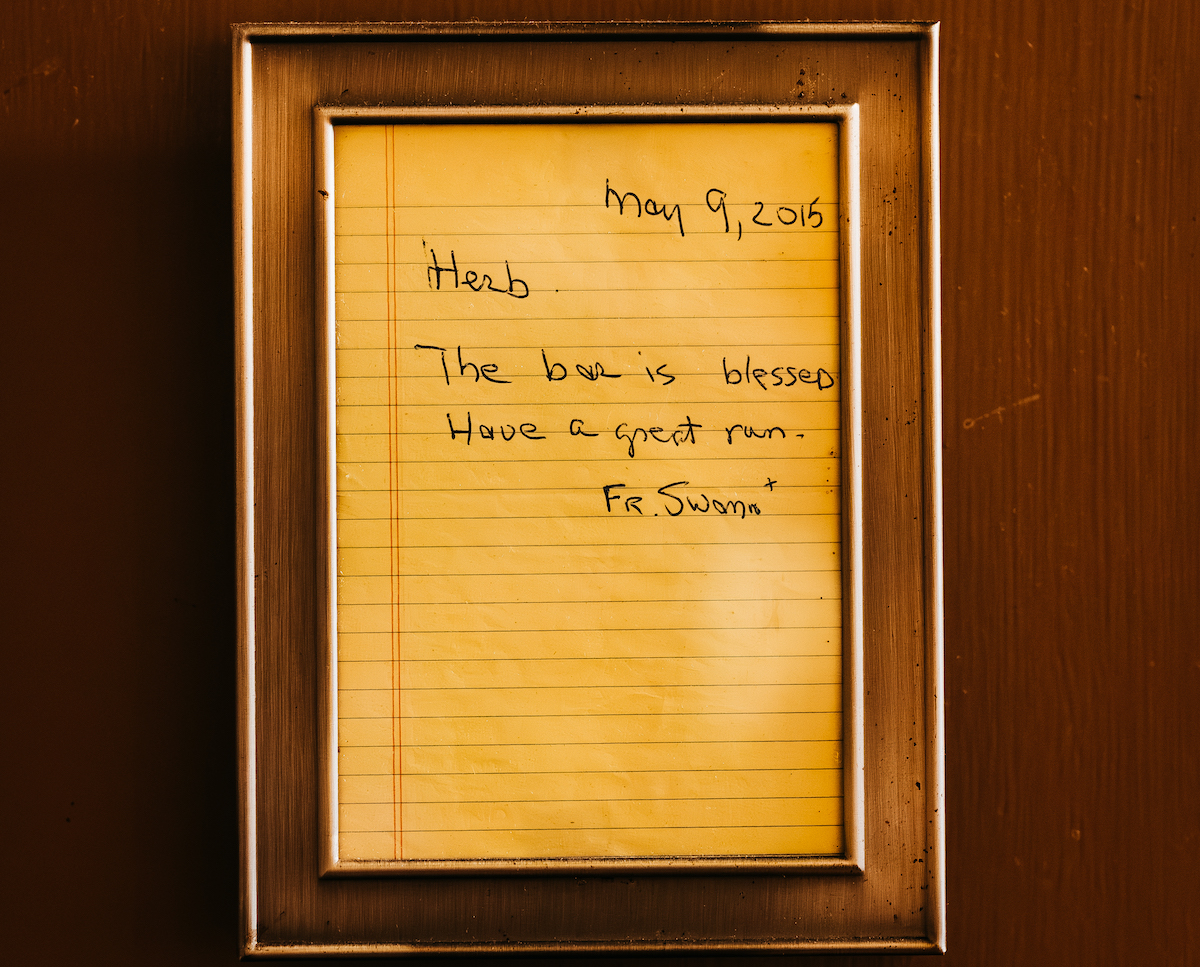 A framed handwritten note from S&D Oyster Company founder Herb Story remains part of the restaurant’s history. | Photo by S&D Oyster Company
