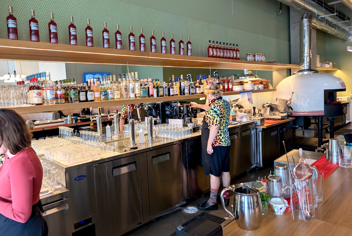The long and sunny bar is perfect for happy hour. | Photo by Linnea Covington