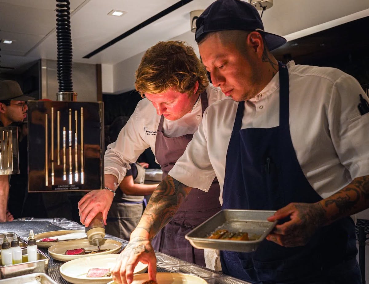 Meridian DAL - DiningOut Chef Eduardo Osorio works alongside a fellow chef during Meridian’s Chef Collective Series, which brings guest chefs into the Dallas restaurant for collaborative dinners. | Photo by The Village