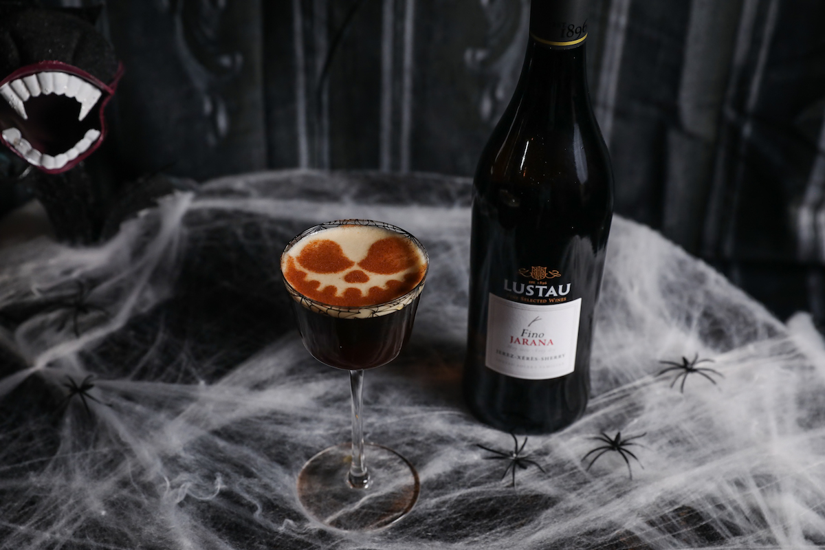 Served in a neon-green skull mug, the Scream Queen cocktail is a frightfully fun addition to Black Lagoon’s Halloween drink lineup. | Photo by Black Lagoon