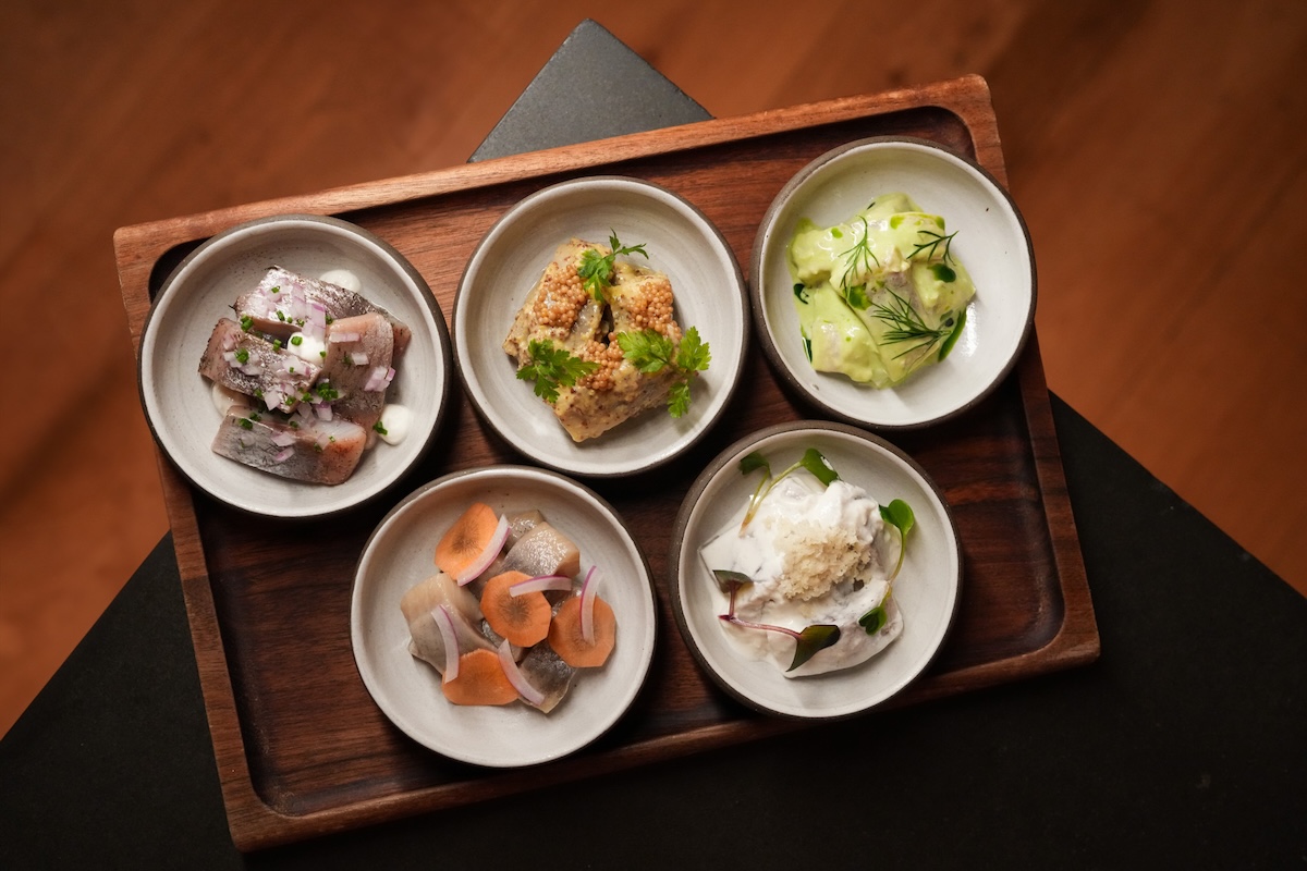 All sorts of pickled herring is a specialty at this Michelin-starred restaurant in NYC. | Photo courtesy of Aquavit